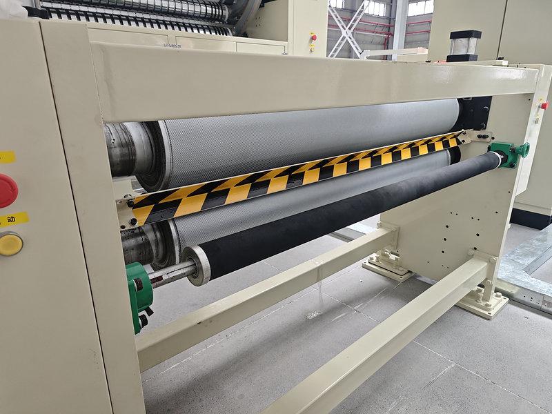 double-tissue-machine-steel-to-steel-embossing-unit.jpg