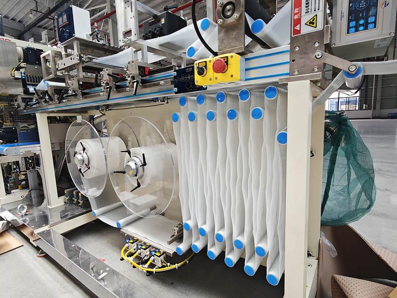 double-tissue-packing-machine-film-unwinding-unit.jpg